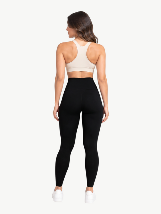 Model wearing JM Brazilian Activewear black high-rise sculpting leggings from the back view