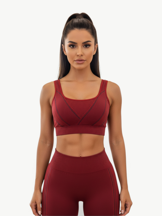 Model wearing JM Brazilian Activewear dark red sculpting sports bra and high-waisted leggings matching set