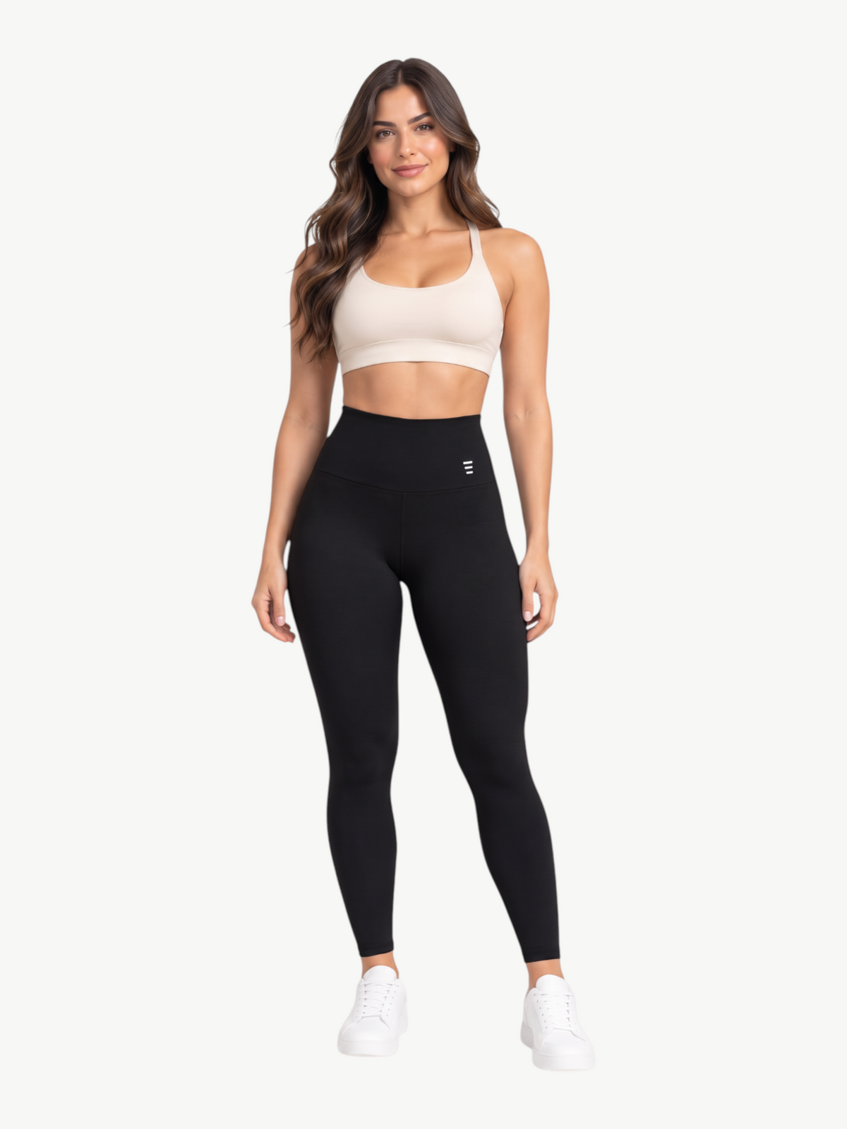 Model wearing JM Brazilian Activewear black high-rise sculpting leggings with compression fit and UPF 50+ protection.