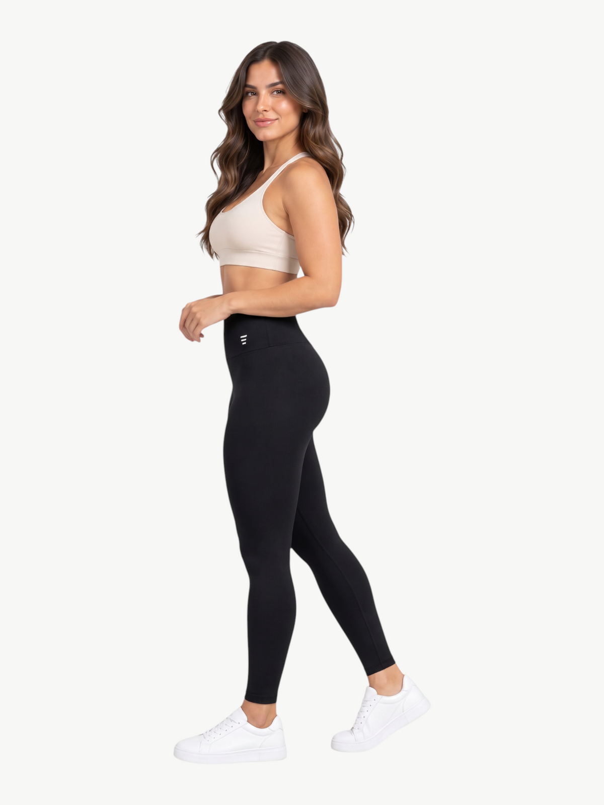 Model wearing JM Brazilian Activewear black high-rise sculpting leggings with supportive compression and stretch.