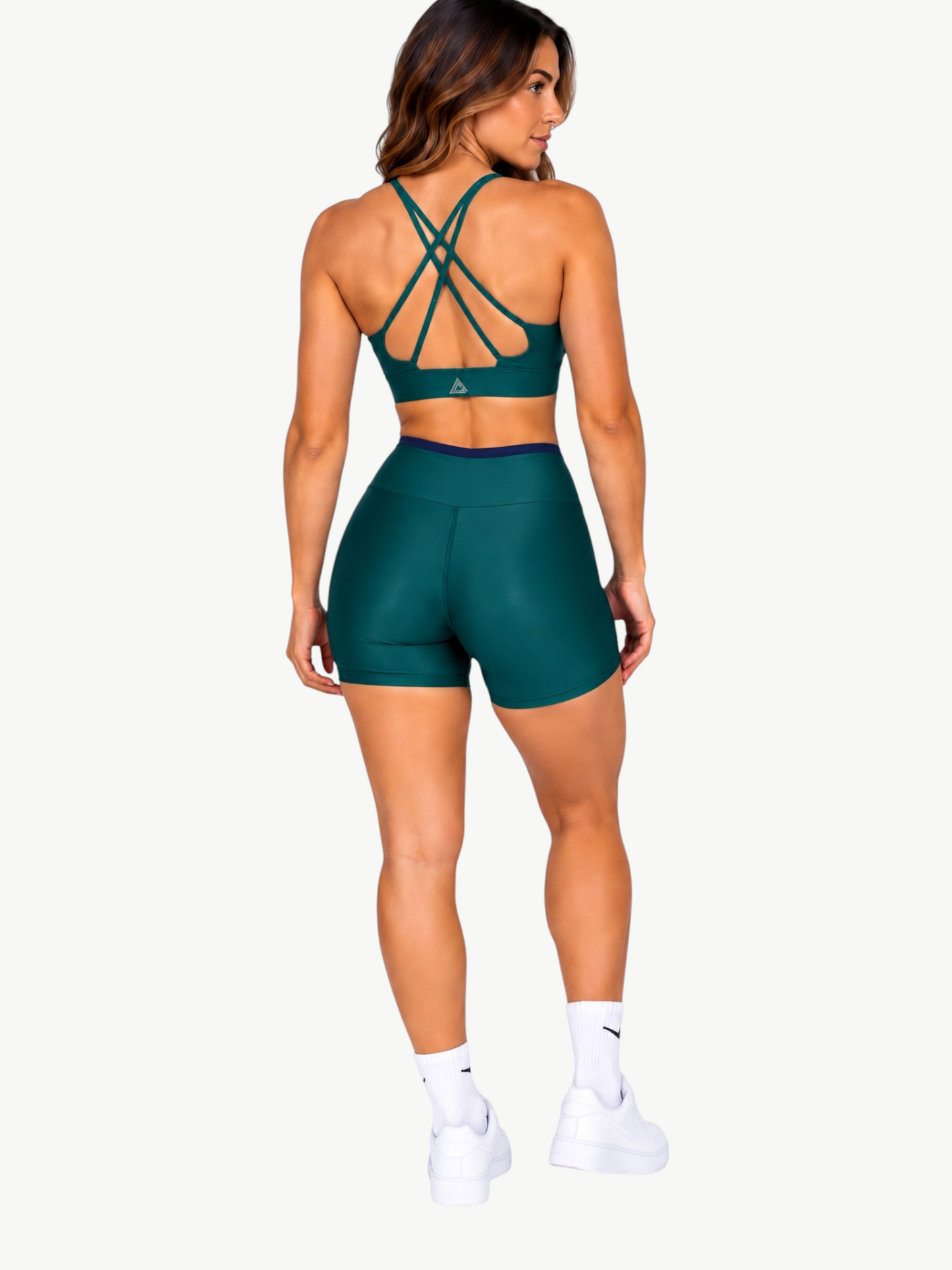 JM Brazilian Activewear dark green Aurora short set with a strappy back crop top and high-waisted shorts, back view.