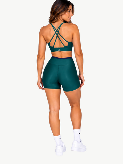 JM Brazilian Activewear dark green Aurora short set with a strappy back crop top and high-waisted shorts, back view.