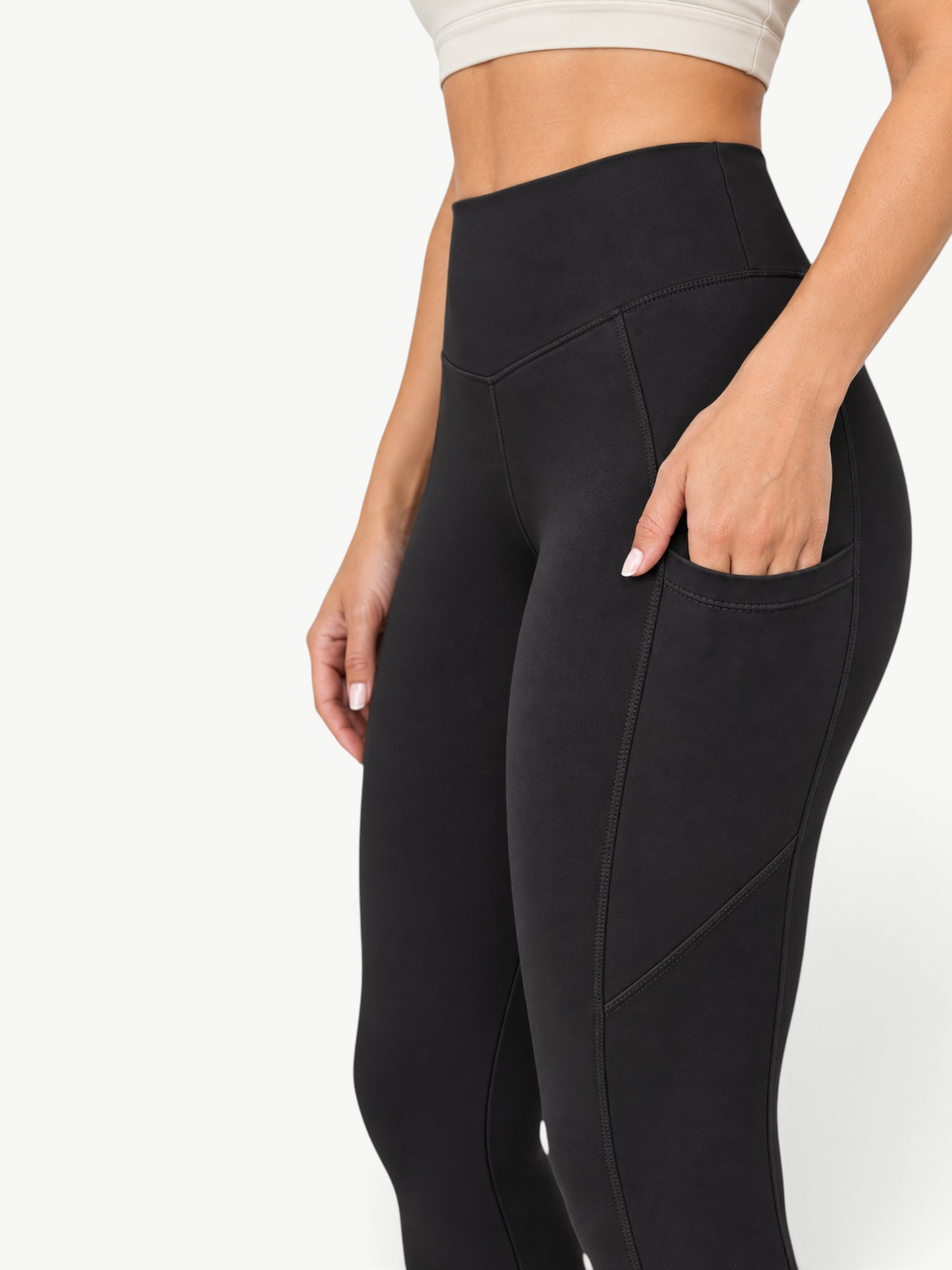 JM Brazilian Activewear black high-rise leggings with functional side pockets and a sculpting, supportive fit.
