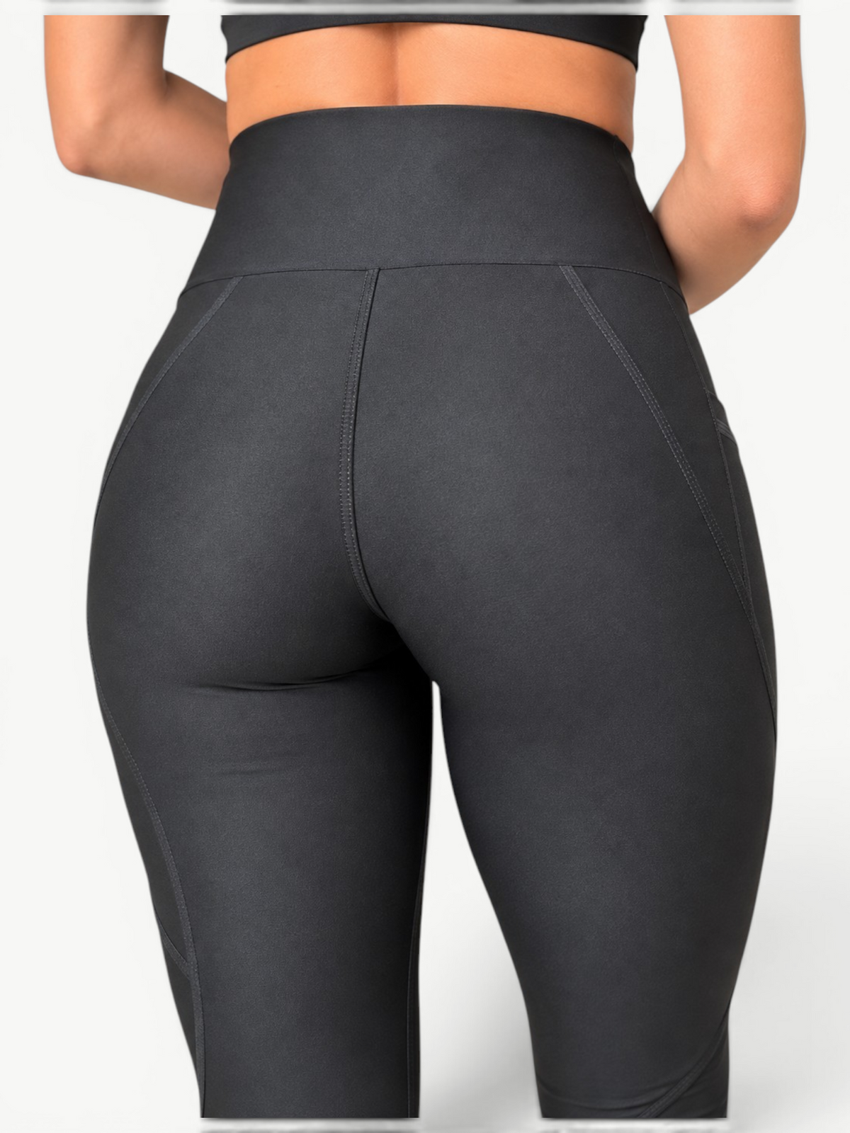 Rear view of JM Brazilian Activewear Polianna Sculpt high-rise black leggings with contour seams and side pockets
