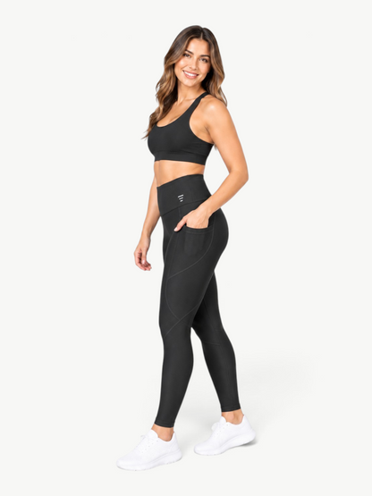 Model wearing JM Brazilian Activewear black high-rise sculpt leggings with side pockets and contour seams