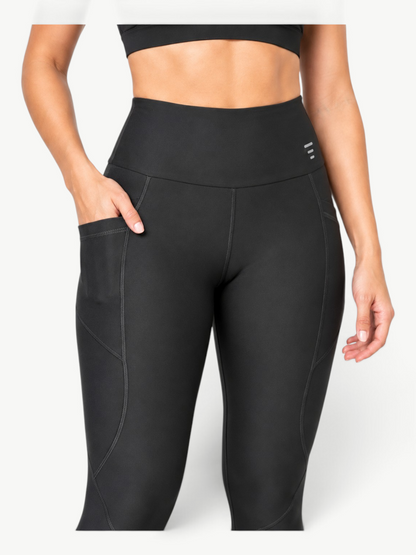 JM Brazilian Activewear black high-rise sculpting leggings with side pockets and contour seams on a model