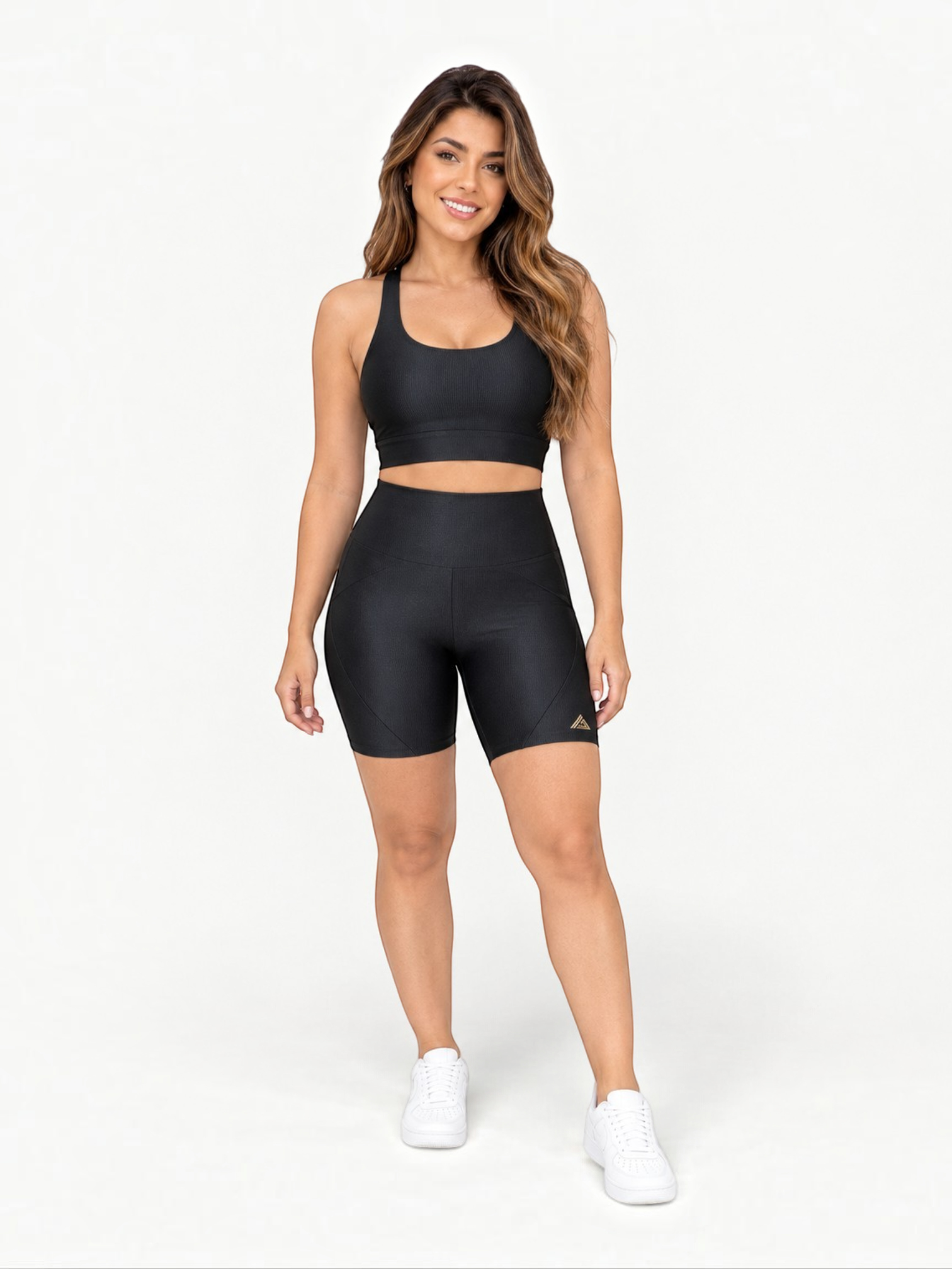 JM Brazilian Activewear black Sculpt Crossback Short Set with a supportive crop top and high-waisted biker shorts.