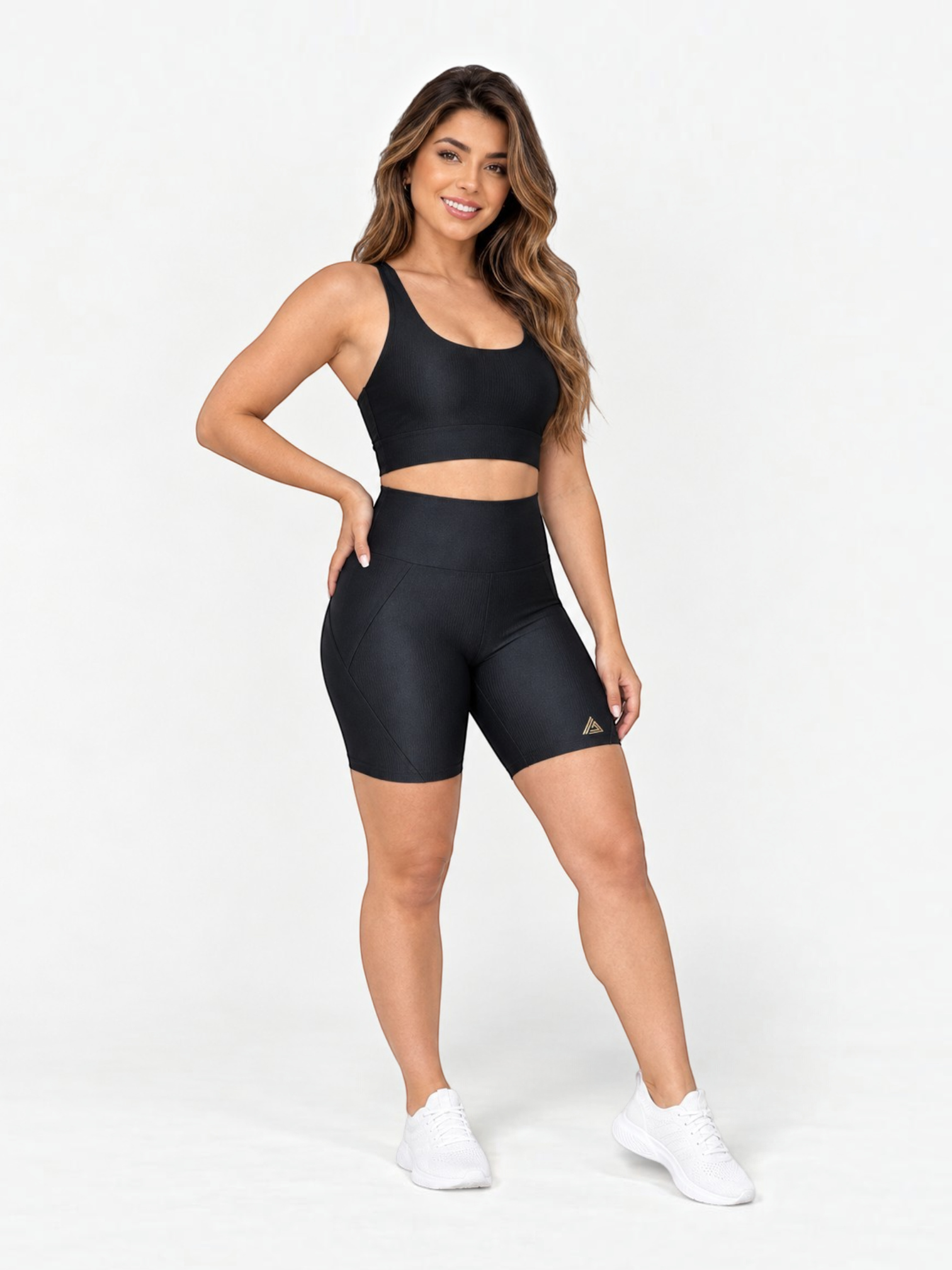 JM Brazilian Activewear black two-piece matching set with a supportive crop top and high-waisted biker shorts.