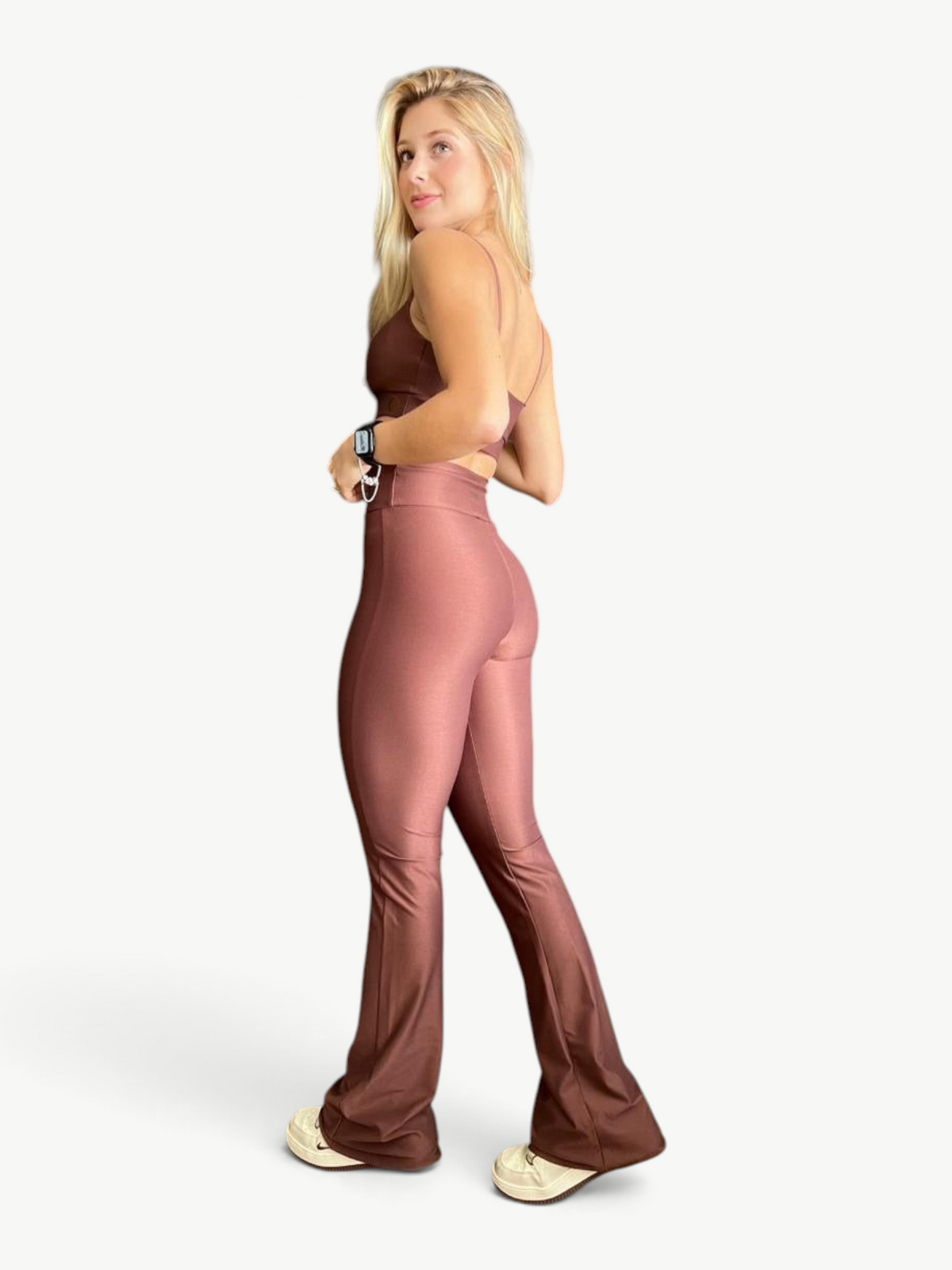 JM Brazilian Activewear brown two-piece set with a fitted crop top and high-waisted flare pants on a blonde model