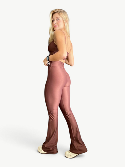 JM Brazilian Activewear brown two-piece set with a fitted crop top and high-waisted flare pants on a blonde model