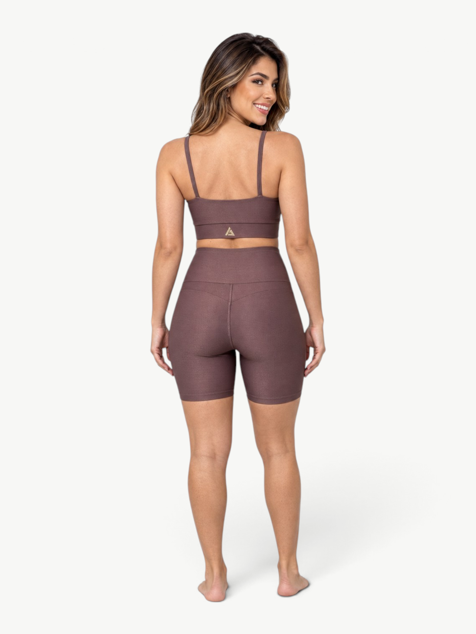 JM Brazilian Activewear brown ribbed two-piece set with a scoop-neck crop top and high-waisted biker shorts.
