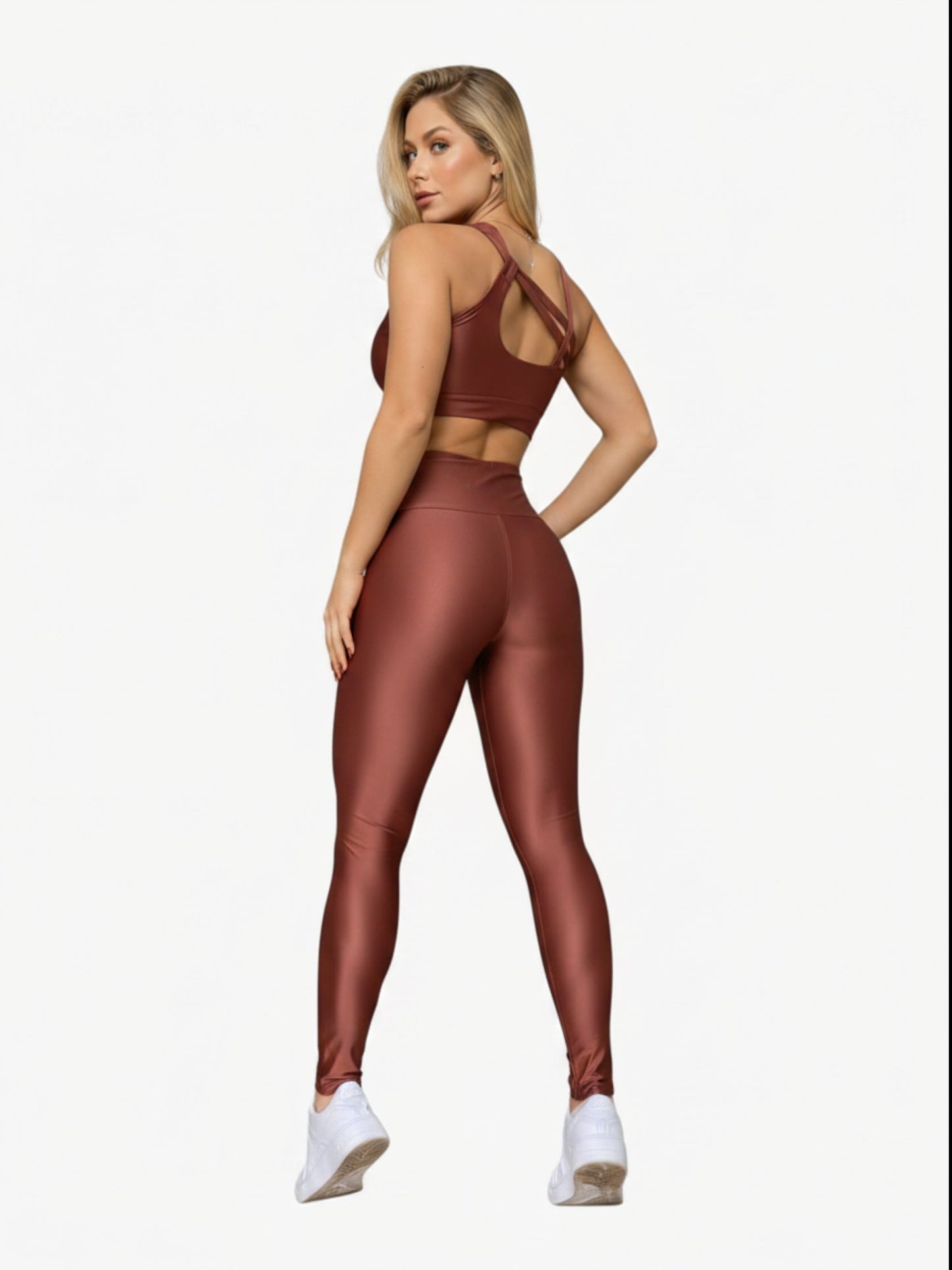 Model wearing a JM Brazilian Activewear brown sculpting crossback top and high-waisted leggings set, back view.