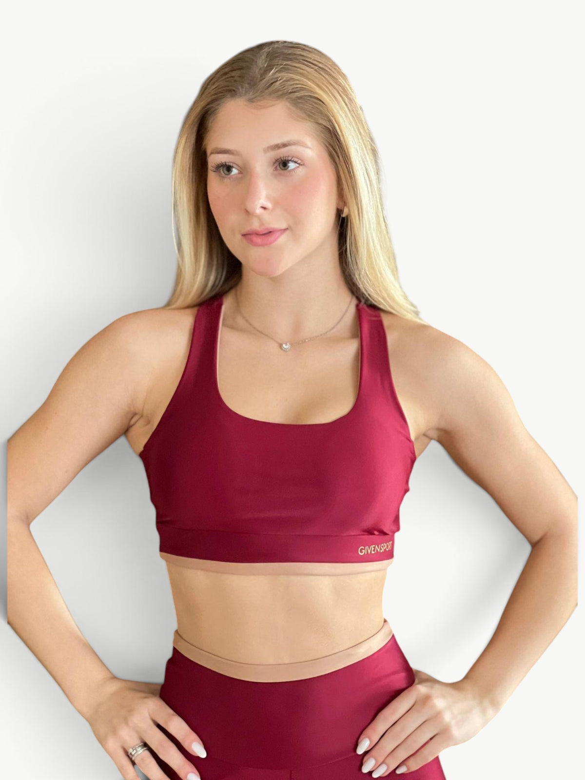 JM Brazilian Activewear burgundy and beige cropped sports bra and high-rise leggings matching set on a blonde model