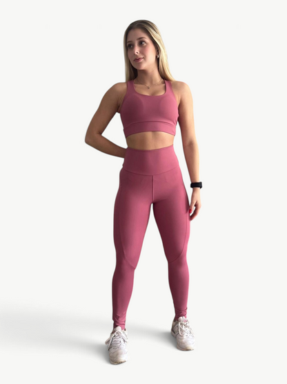 Model wearing a dusty rose JM Brazilian Activewear Soul Legging Set with a supportive sports bra and high-waisted leggings