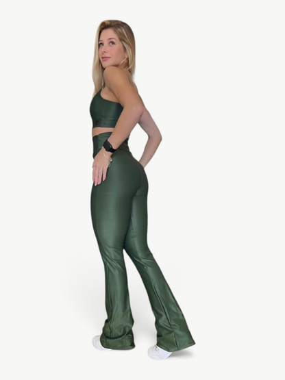 JM Brazilian Activewear dark green two-piece set with a fitted crop top and high-waisted flare pants on a model.