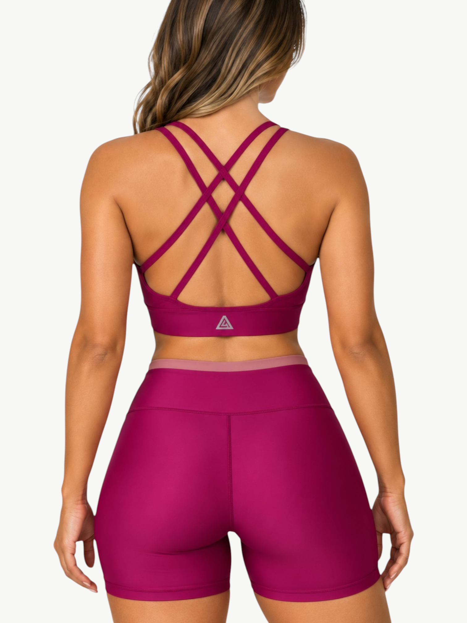 JM Brazilian Activewear Aurora Short Set in magenta with a supportive crisscross back crop top and high-waisted shorts