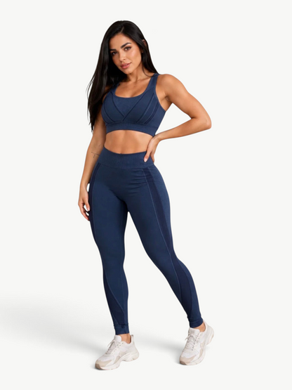 Model wearing a navy blue JM Brazilian Activewear Sculpt Legging Set with a supportive sports bra and high-waisted leggings