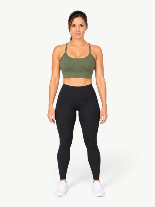 Model wearing JM Brazilian Activewear olive green Essential Sculpt Top with scoop neckline and supportive seams.