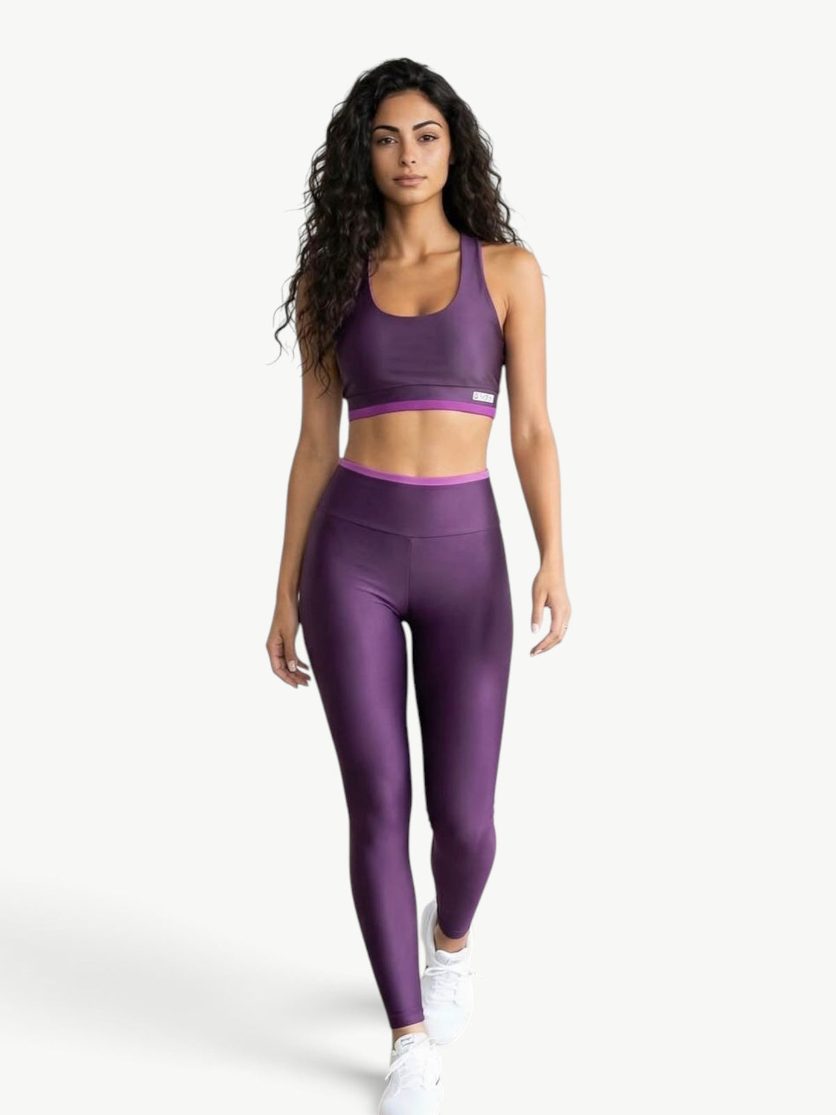 Model wearing a JM Brazilian Activewear purple Speed Contrast Legging Set with cropped top and high-rise leggings.