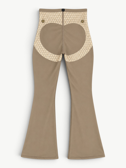 JM Brazilian Activewear sculpting leggings in taupe with a beige geometric mesh back panel and gold button details.